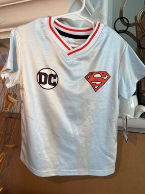 DC Light Blue Jersey with Red Superman Shield and Black DC Logo